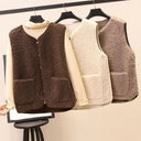 Moumoute-sans-manche-femme-marron-et-beige