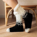 chaussette-moelleuse-adult-noir-avec-bord-doux