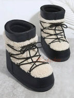 Apres-ski-moumoute-noir-et-blanc