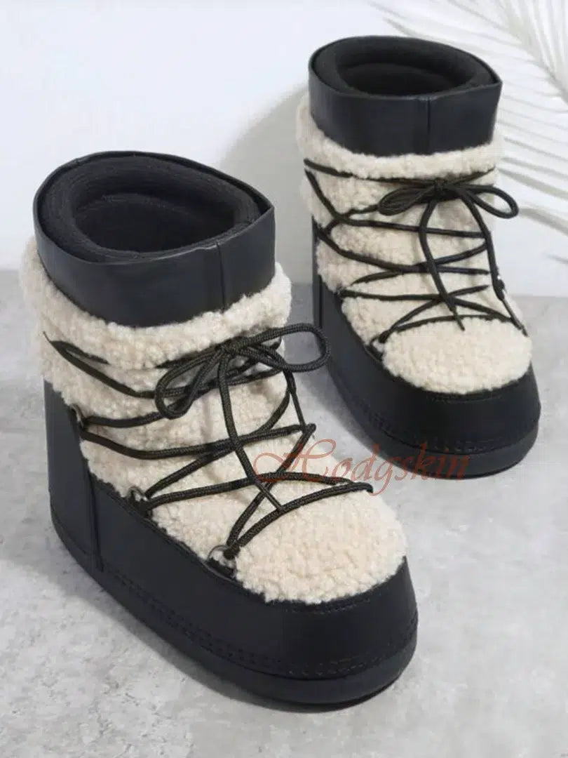 Apres-ski-moumoute-noir-et-blanc