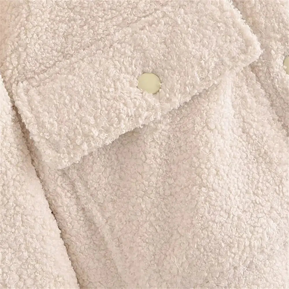 Blouson-interieur-moumoute-blanc-avec-poches-et-col