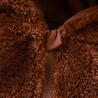 Combi-pilote-moumoute-marron-avec-capuche-ours