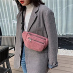 Sac-ceinture-pelucheux-rose-avec-poches-zippees