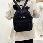 Sac-dos-moumoute-rose-avec-poche-avant-zippee