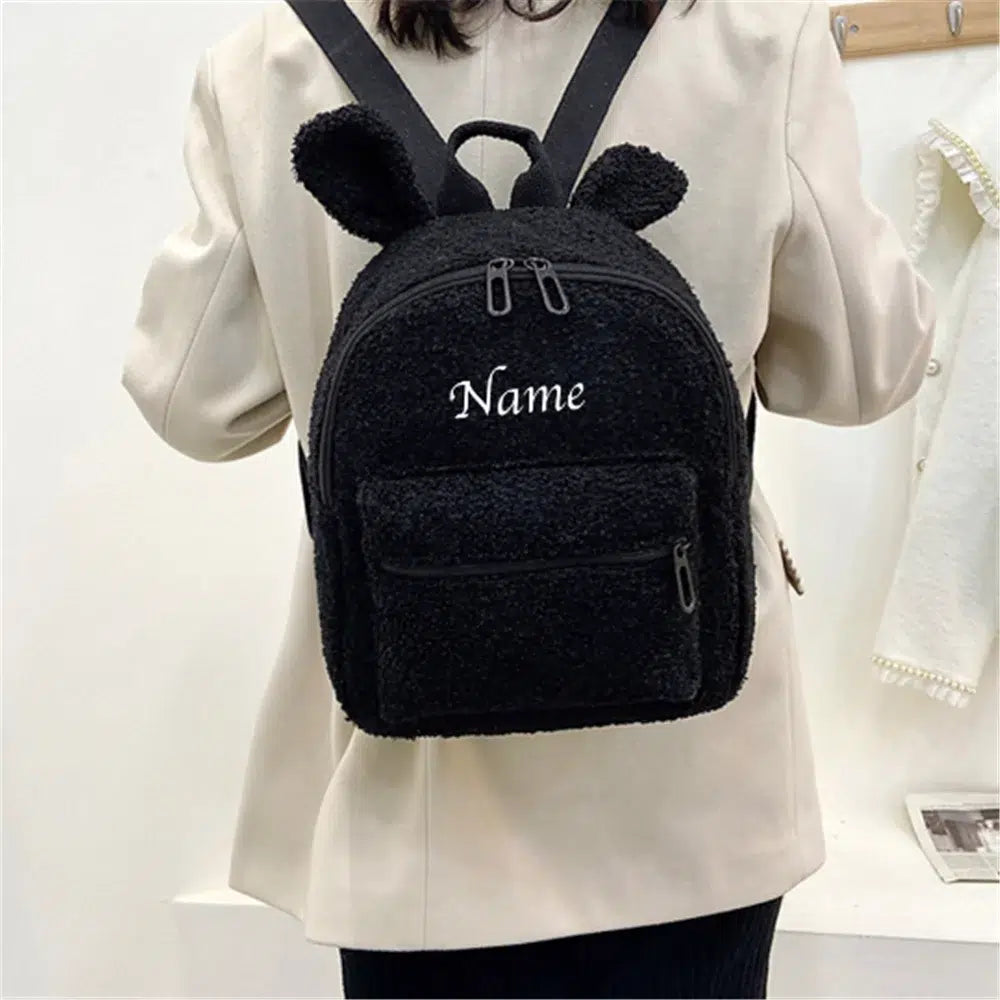 Sac-dos-moumoute-rose-avec-poche-avant-zippee