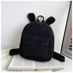 Sac-dos-pelucheux-noir-avec-zip-pratique