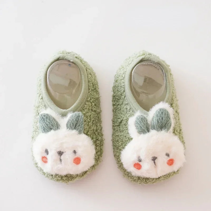chausson-doux-bebe-vert-avec-motif-lapin